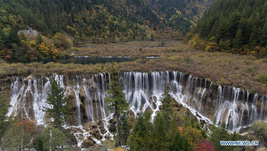 Aerial photo taken on Oct. 18, 2018 shows renovated infrastructures at the Jiuzhaigou Valley Scenic Area in Jiuzhaigou County, southwest China\'s Sichuan Province. The magnitude-7.0 earthquake that hit here on Aug. 8, 2017 and the flooding of this summer caused damages of various degrees to the Jiuzhaigou Valley Scenic Area, which has been temporarily closed since July for renovation. (Xinhua/Jiang Hongjing)