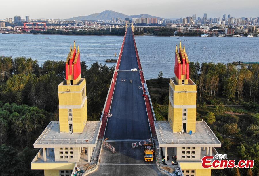 A drone photo shows the Nanjing Yangtze River Bridge, which is undergoing renovation work, in Nanjing City, Jiangsu Province, Oct. 18, 2018. A double-decked road-rail truss bridge across the Yangtze River, it was completed and open for traffic in 1968 and remains one of the most famous landmarks in China. The bridge is set to reopen by the end of the year. (Photo: China News Service/Yang Bo)