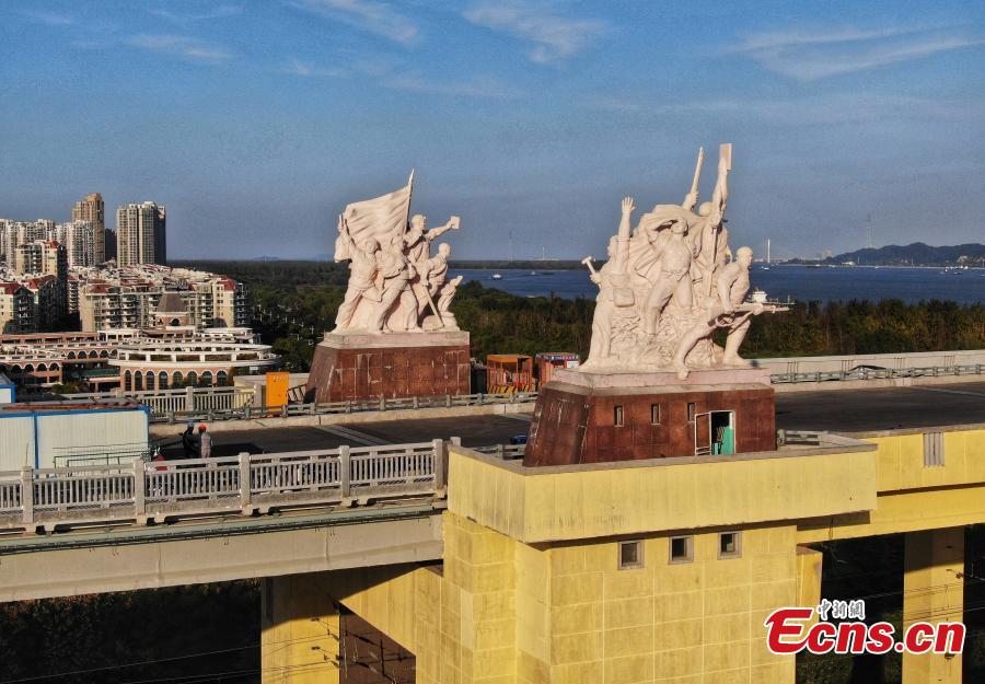 A drone photo shows the Nanjing Yangtze River Bridge, which is undergoing renovation work, in Nanjing City, Jiangsu Province, Oct. 18, 2018. A double-decked road-rail truss bridge across the Yangtze River, it was completed and open for traffic in 1968 and remains one of the most famous landmarks in China. The bridge is set to reopen by the end of the year. (Photo: China News Service/Yang Bo)