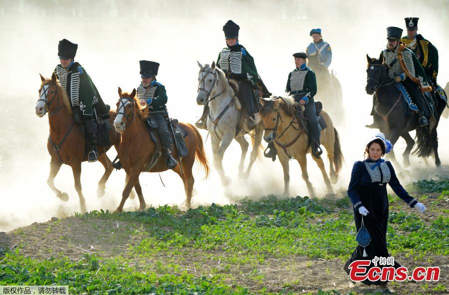 Riders arrive during the reconstruction of the Battle of the Nations at the 205th anniversary near Leipzig, Germany, Oct. 20, 2018. The Battle of Leipzig or Battle of the Nations, on 16?19 October 1813, was fought by the coalition armies of Russia, Prussia, Austria and Sweden against the French army of Napoleon. The battle decided that Napoleon had to retreat to France, the beginning of his downfall. (Photo/Agencies)