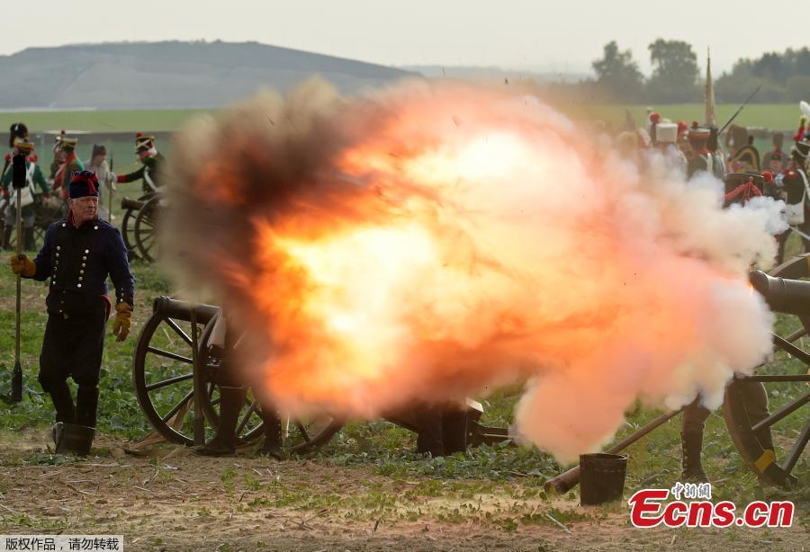 Troops fight during the reconstruction of the Battle of the Nations at the 205th anniversary near Leipzig, Germany, Oct. 20, 2018. The Battle of Leipzig or Battle of the Nations, on 16?19 October 1813, was fought by the coalition armies of Russia, Prussia, Austria and Sweden against the French army of Napoleon. The battle decided that Napoleon had to retreat to France, the beginning of his downfall. (Photo/Agencies)