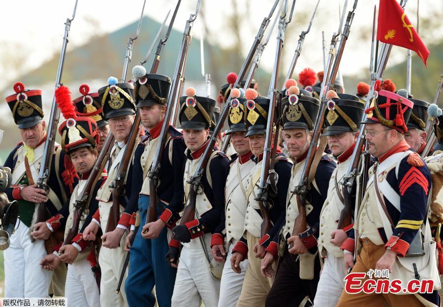 Troops arrive during the reconstruction of the Battle of the Nations at the 205th anniversary near Leipzig, Germany, Oct. 20, 2018. The Battle of Leipzig or Battle of the Nations, on 16?19 October 1813, was fought by the coalition armies of Russia, Prussia, Austria and Sweden against the French army of Napoleon. The battle decided that Napoleon had to retreat to France, the beginning of his downfall. (Photo/Agencies)