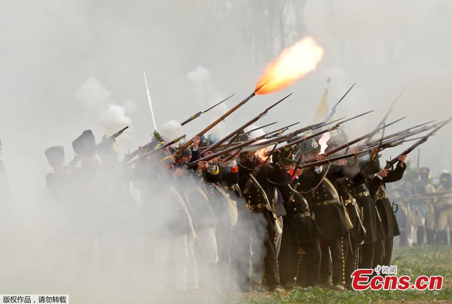 Troops fight during the reconstruction of the Battle of the Nations at the 205th anniversary near Leipzig, Germany, Oct. 20, 2018. The Battle of Leipzig or Battle of the Nations, on 16?19 October 1813, was fought by the coalition armies of Russia, Prussia, Austria and Sweden against the French army of Napoleon. The battle decided that Napoleon had to retreat to France, the beginning of his downfall. (Photo/Agencies)