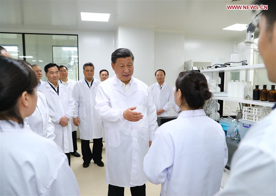 Chinese President Xi Jinping, also general secretary of the Communist Party of China Central Committee and chairman of the Central Military Commission, visits the Traditional Chinese Medicine Science and Technology Industrial Park of Co-operation between Guangdong and Macao in Zhuhai, south China\'s Guangdong Province, Oct. 22, 2018. Xi made an inspection tour in Zhuhai on Monday. (Xinhua/Xie Huanchi)