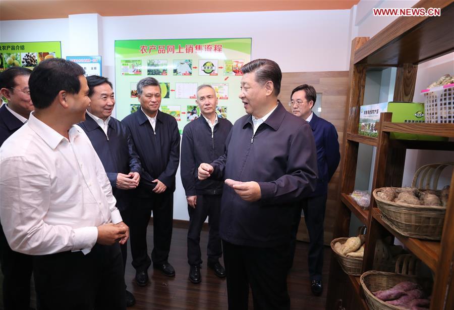 Chinese President Xi Jinping, also general secretary of the Communist Party of China Central Committee and chairman of the Central Military Commission, visits an e-commerce industrial park in Yingde of Qingyuan City, south China\'s Guangdong Province, during an inspection tour, Oct. 23, 2018. (Xinhua/Ju Peng)