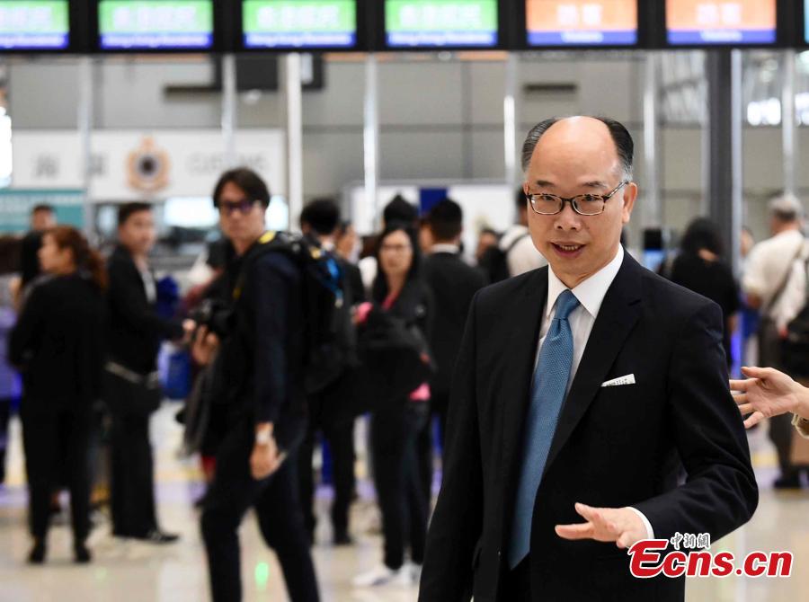 Frank Chan Fan, secretary for Transport and Housing in Hong Kong, talks to reporters as coach services start over the Hong Kong-Zhuhai-Macao Bridge, Oct. 24, 2018.