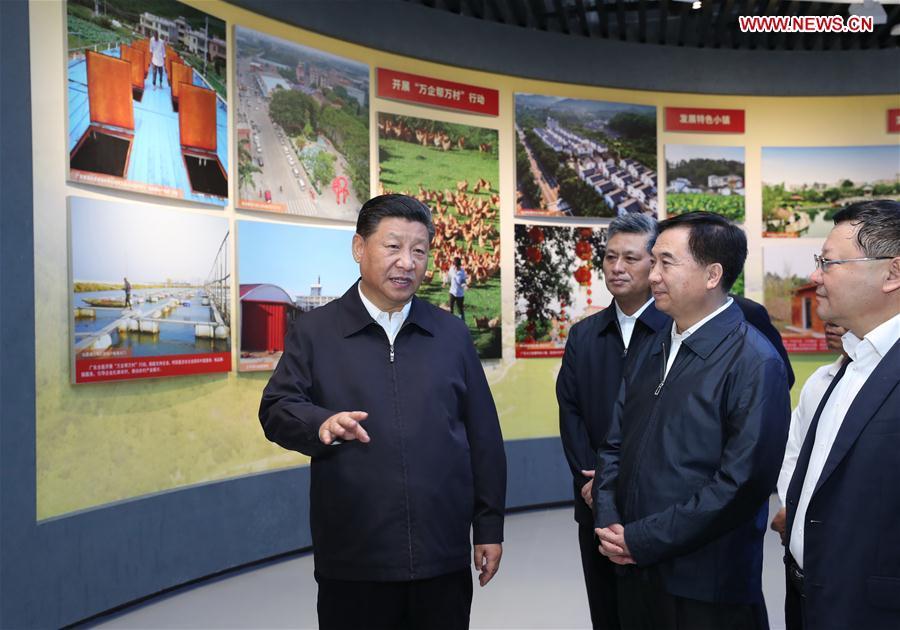 Chinese President Xi Jinping, also general secretary of the Communist Party of China Central Committee and chairman of the Central Military Commission, visits an exhibition on Guangdong\'s development during the past 40 years since the reform and opening up at a museum in Shenzhen, south China\'s Guangdong Province, during an inspection tour, Oct. 24, 2018. (Xinhua/Ju Peng)