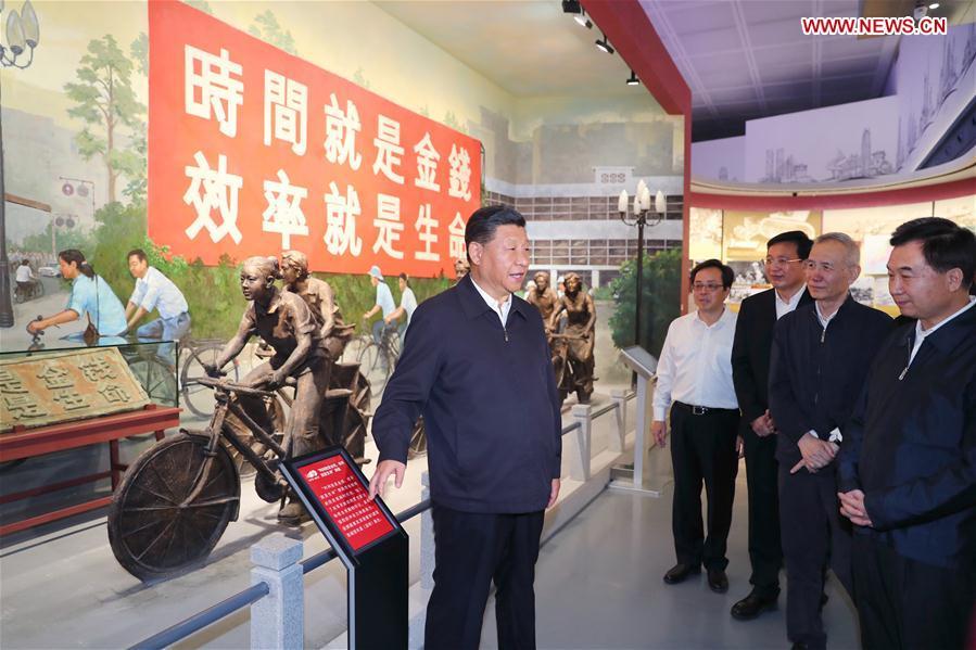 Chinese President Xi Jinping, also general secretary of the Communist Party of China Central Committee and chairman of the Central Military Commission, visits an exhibition on Guangdong\'s development during the past 40 years since the reform and opening up at a museum in Shenzhen, south China\'s Guangdong Province, during an inspection tour, Oct. 24, 2018. (Xinhua/Xie Huanchi)