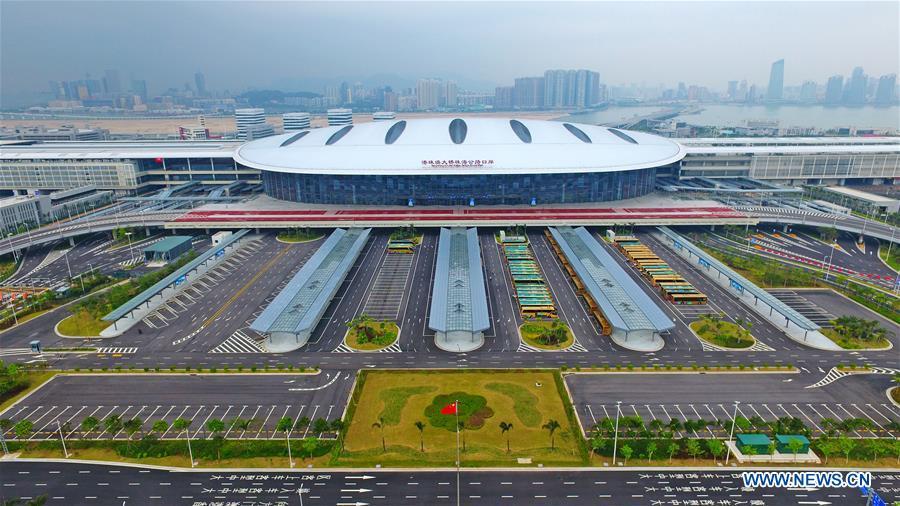 Aerial photo taken on Oct. 24, 2018 shows the Zhuhai Port of the Hong Kong-Zhuhai-Macao Bridge in Zhuhai, south China\'s Guangdong Province. The Hong Kong-Zhuhai-Macao bridge, the world\'s longest cross-sea bridge, opened to public traffic at 9 a.m. Wednesday. (Xinhua/Liang Xu)