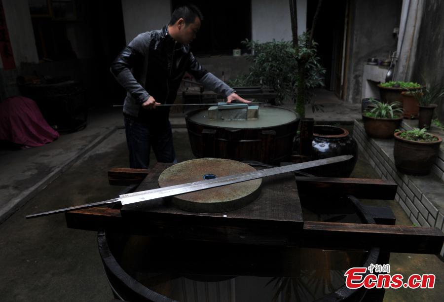 A sword-making workshop in Songxi County in East China’s Fujian Province. Zhanlu Mountain in southern Songxi, well-known for its long history and strong culture, is said to have been the home to the most revered among top five most famous swords in ancient China. Chinese poets in the Tang and Song dynasties, including Du Fu, Li Bai and Su Shi, penned lines in praise of the Zhanlu swords, nicknamed as the “No. 1 Sword Under the Heaven”. In 1985, local craftsmen went to huge efforts, reading historical literature and working with research institutes in Beijing and Nanjing, to finally craft Zhanlu swords by hand again. Making a Zhanlu sword involves more than 100 time-consuming steps, including forging, quenching and grinding. (Photo: China News Service/Zhang Bin)