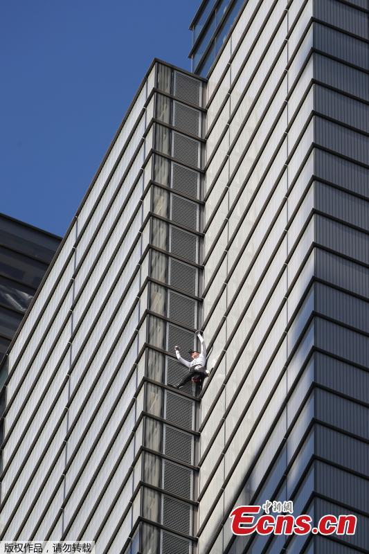 French urban climber Alain Robert, also known as \