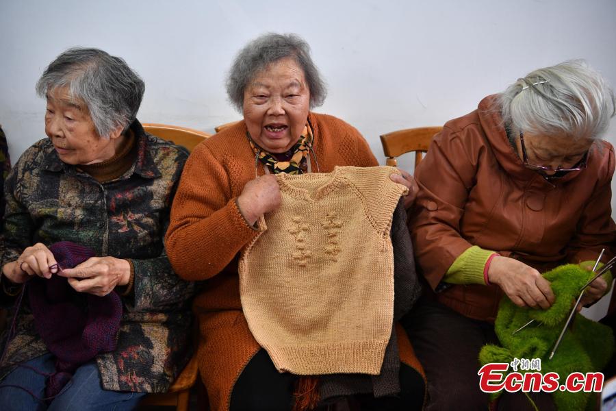 Old ladies knit sweaters for children in poor areas in Kunming, Southwest China’s Yunnan province on November 1, 2018. The ladies, who are retirees of a local hospital, formed a knitting club to make and send out cozy sweaters for the needy. A total of 19 knitters, whose average age is 75, have worked tirelessly in the past nine months, knitting 184 warm sweaters in their spare time for needy children in a village in Qiaojia county of the province. (Photo: China News Service/ Liu Ranyang)