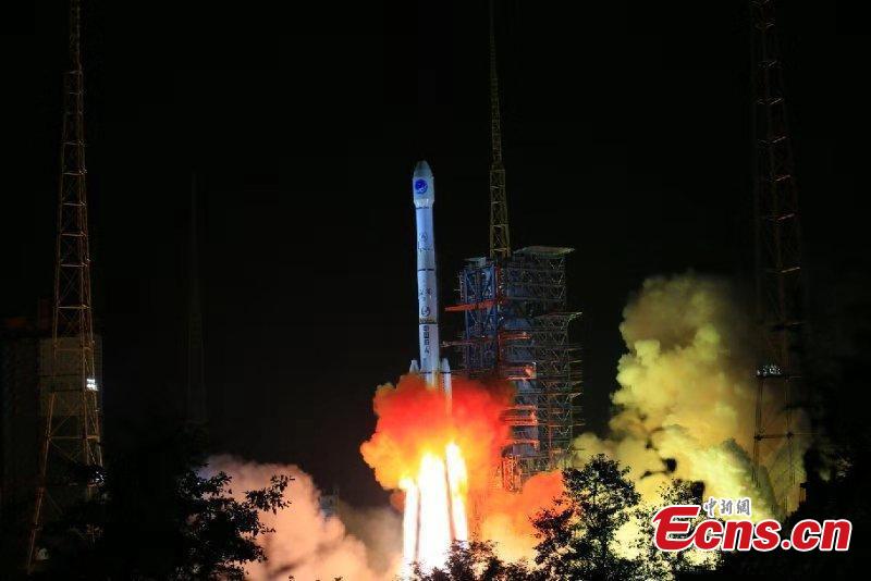 China\'s home-grown global satellite navigation system came a step closer to completion with the launch of another BeiDou-3 satellite at 11:57 p.m. Thursday from the Xichang Satellite Launch Center, in the southwestern Sichuan Province. Launched on a Long March-3B carrier rocket, it is the 41st of the BeiDou navigation system, and will work with 16 other Beidou-3 satellites already in orbit. It is also the first BeiDou-3 satellite in high orbit, about 36,000 km above the Earth. In a geostationary orbit, following the Earth\'s rotation, it will view the same point on Earth continuously. (Photo: China News Service/Liang Keyan)