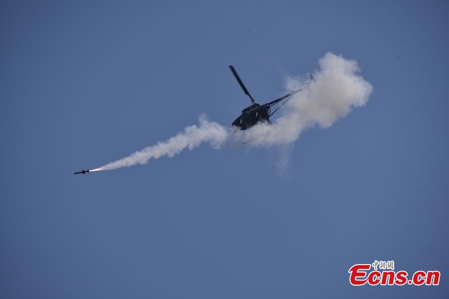 China successfully launched a missile from an unmanned attack helicopter AV500W, with the projectile hitting a target 4.5 kilometers from the aircraft. The aircraft, developed and produced by the Aviation Industry Corp of China, the State-owned aircraft giant, has a maximum takeoff weight of 500 kilograms, a maximum speed of 170 kilometers per hour and a flight ceiling of 5,000 meters.(Photo: China News Service/He Huan)