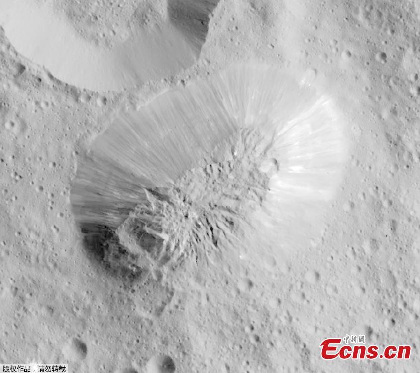This image provided by NASA, shows an inactive volcano on the surface of Ceres, the largest object in the asteroid belt between Mars and Jupiter. Scientists said the volcano on the dwarf planet Ceres is about half as tall as Mount Everest. (Photo/Agencies)