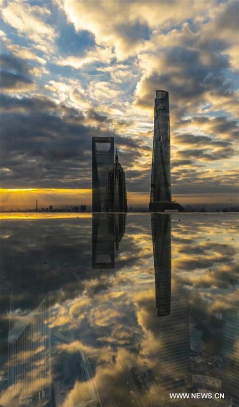 Photo taken on Nov. 2, 2018 shows skyscrapers at dawn in Shanghai, east China. The first China International Import Expo (CIIE) will be held on Nov. 5-10 in Shanghai. (Xinhua/Shen Bohan)