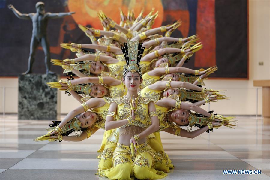 Artists of China Disabled People\'s Performing Art Troupe perform Thousand-hand Bodhisattva dance at the United Nations headquarters in New York, on Nov. 5, 2018. This event is co-sponsored by the United Nations Postal Administration (UNPA) along with the Permanent Mission of China to the UN, which holds the presidency of the Security Council for November. (Xinhua/Li Muzi)