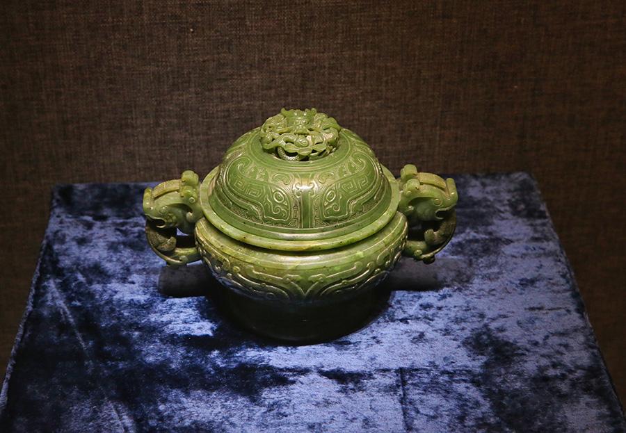 A selection of 93 jades from the holdings of the Summer Palace and the Institute of Qing History of Renmin University are on show at the Summer Palace\'s Dehe Garden through Dec. 8. (Photo/China Daily)
