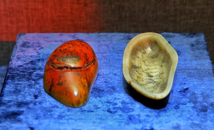 A selection of 93 jades from the holdings of the Summer Palace and the Institute of Qing History of Renmin University are on show at the Summer Palace\'s Dehe Garden through Dec. 8. (Photo/China Daily)