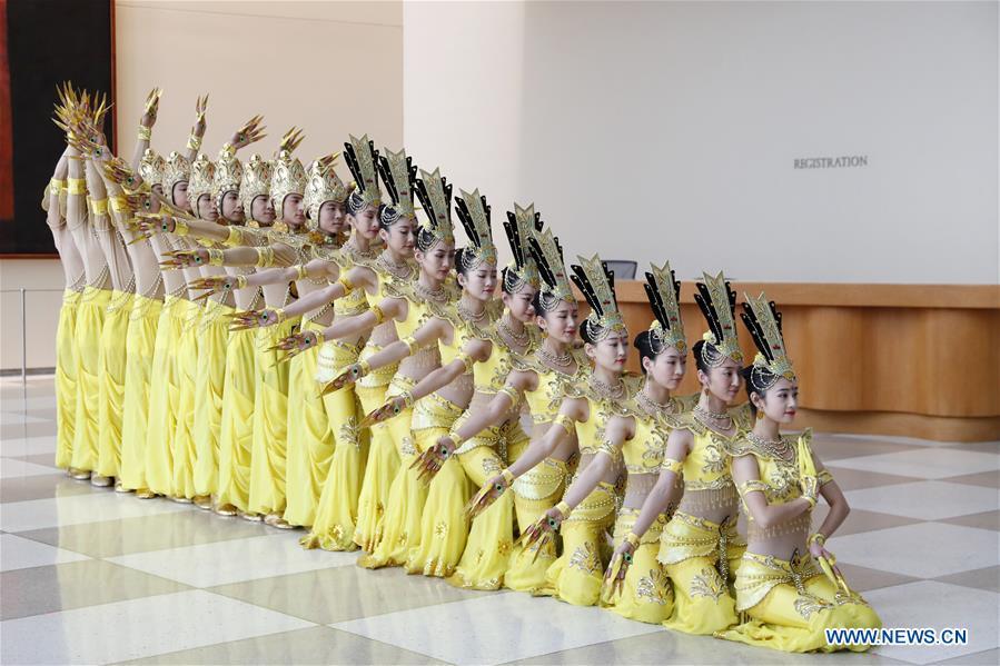 Artists of China Disabled People\'s Performing Art Troupe perform Thousand-hand Bodhisattva dance at the United Nations headquarters in New York, on Nov. 5, 2018. This event is co-sponsored by the United Nations Postal Administration (UNPA) along with the Permanent Mission of China to the UN, which holds the presidency of the Security Council for November. (Xinhua/Li Muzi)
