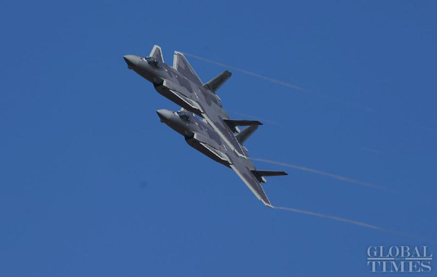 China\'s most advanced stealth fighter jet, the J-20, performs at the China International Aviation and Aerospace Exhibition which kicked off in Zhuhai, South China\'s Guangdong Province, on Nov. 6. The exhibition is scheduled to be held from Nov. 6 to 11. (Photos: Cui Meng/GT)