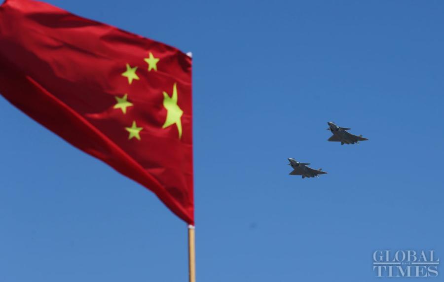 China\'s most advanced stealth fighter jet, the J-20, performs at the China International Aviation and Aerospace Exhibition which kicked off in Zhuhai, South China\'s Guangdong Province, on Nov. 6. The exhibition is scheduled to be held from Nov. 6 to 11. (Photos: Cui Meng/GT)