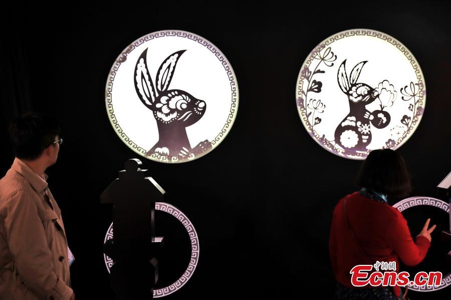 Using TensorFlow, an open source machine learning platform, Google’s ShadowPlay enables visitors to transform shadow figures from hand gestures into digital animations at the first China International Import Expo (CIIE) in Shanghai, east China, Nov. 7 2018. The installation, built using TensorFlow, uses AI to recognize a person’s hand gestures and then magically transform the shadow figure into digital animations representing the 12 animals of the Chinese zodiac and in an interactive show. (Photo: China News Service/Zhang Hengwei)