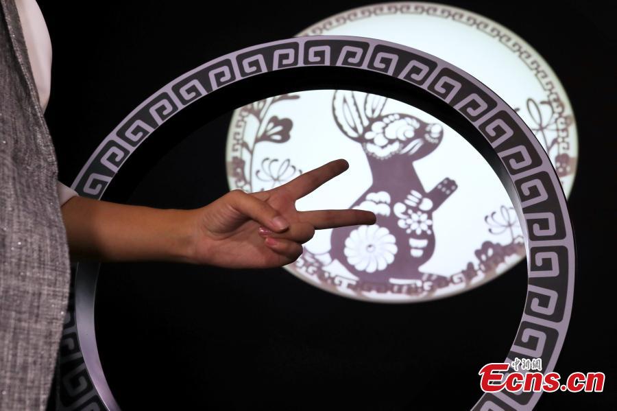 Using TensorFlow, an open source machine learning platform, Google’s ShadowPlay enables visitors to transform shadow figures from hand gestures into digital animations at the first China International Import Expo (CIIE) in Shanghai, east China, Nov. 7 2018. The installation, built using TensorFlow, uses AI to recognize a person’s hand gestures and then magically transform the shadow figure into digital animations representing the 12 animals of the Chinese zodiac and in an interactive show. (Photo: China News Service/Zhang Hengwei)