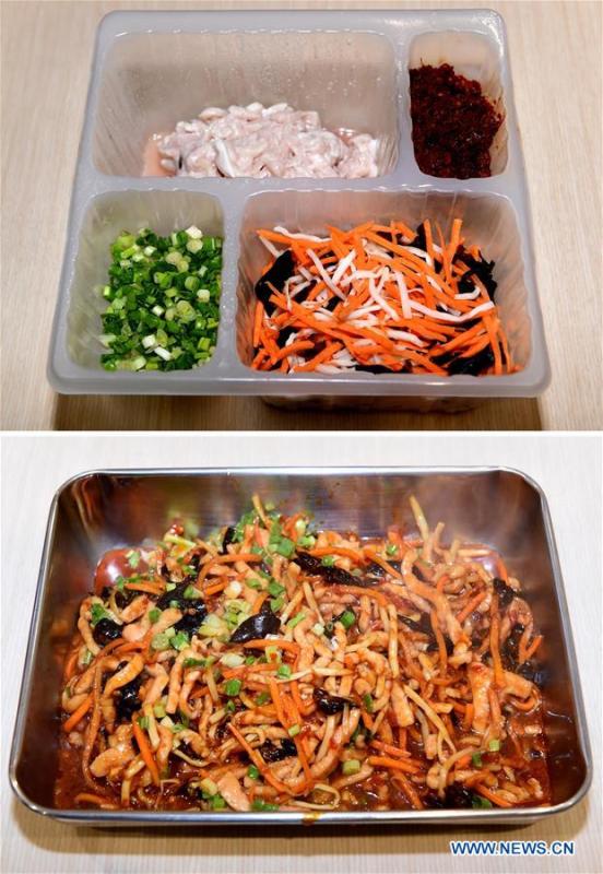 Dishes prepared with the cooking machine are shown in a cookless restaurant in central Beijing, capital of China, Nov. 7, 2018. The restaurant, equipped with 7 cooking machines that are programmed to prepare some popular Chinese dishes in minutes without human interference. Working along with smart payment and raw material supply systems, the cooking machine provides instant and standardized dishes. (Xinhua/Luo Xiaoguang)
