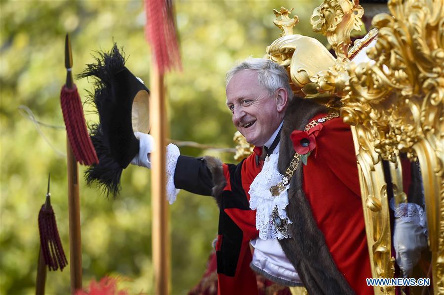 Peter Estlin, the 691st Lord Mayor of the City of London, waves to the crowd from the Gold State Coach during the Lord Mayor\'s Show outside St Paul\'s Cathedral in London, Britain, on Nov. 10, 2018. As the elected head of the City of London Corporation, Peter Estlin will serve as a global ambassador for the UK-based financial and professional services industry for a one-year term. (Xinhua/Stephen Chung)