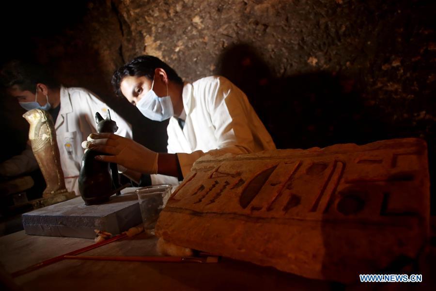 Archeologists work in a tomb in Saqqara Necropolis, Giza Province, Egypt, on Nov. 10, 2018. Egypt\'s Minister of Antiquities Khaled al-Anany announced Saturday the discovery of seven pharaonic tombs in Saqqara Necropolis. (Xinhua/Ahmed Gomaa)
