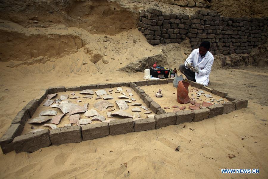 An archeologist works in Saqqara Necropolis, Giza Province, Egypt, on Nov. 10, 2018. Egypt\'s Minister of Antiquities Khaled al-Anany announced Saturday the discovery of seven pharaonic tombs in Saqqara Necropolis. (Xinhua/Ahmed Gomaa)