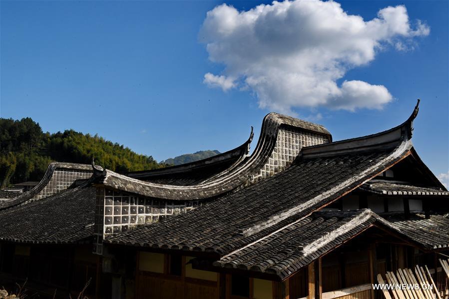 Photo taken on Nov. 11, 2018 shows the scenery of Aijing Zhuang residential complex in Yangwei Village of Yongtai County, southeast China\'s Fujian Province. The project, with a total of 361 rooms covering the area of over 5,200 square meters, was built during the reign of Emperor Daoguang in the Qing Dynasty. It has safeguarded the authentic character of the vernacular housing, defensive structures and waterways that are emblematic of this site, providing a model for other historic villages across China. The conservation of Aijing Zhuang residential complex demonstrates a sensitive approach to sustaining a rural settlement as a living place in harmony with its natural setting. Aijing Zhuang in November this year received the Award of Merit in the 2018 UNESCO Asia-Pacific Awards for Cultural Heritage Conservation. (Xinhua/Zhang Guojun)