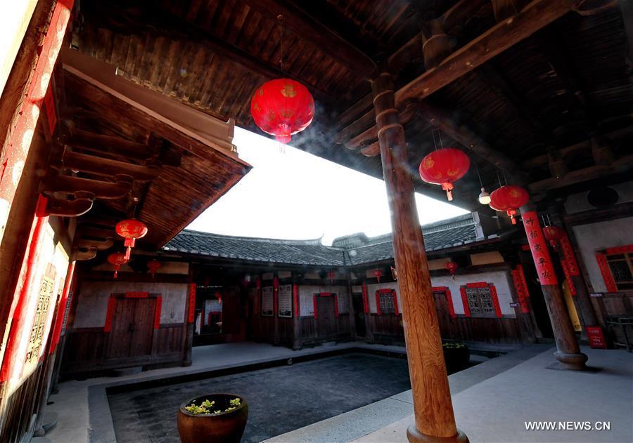 Photo taken on Nov. 11, 2018 shows the scenery of Aijing Zhuang residential complex in Yangwei Village of Yongtai County, southeast China\'s Fujian Province. The project, with a total of 361 rooms covering the area of over 5,200 square meters, was built during the reign of Emperor Daoguang in the Qing Dynasty. It has safeguarded the authentic character of the vernacular housing, defensive structures and waterways that are emblematic of this site, providing a model for other historic villages across China. The conservation of Aijing Zhuang residential complex demonstrates a sensitive approach to sustaining a rural settlement as a living place in harmony with its natural setting. Aijing Zhuang in November this year received the Award of Merit in the 2018 UNESCO Asia-Pacific Awards for Cultural Heritage Conservation. (Xinhua/Zhang Guojun)