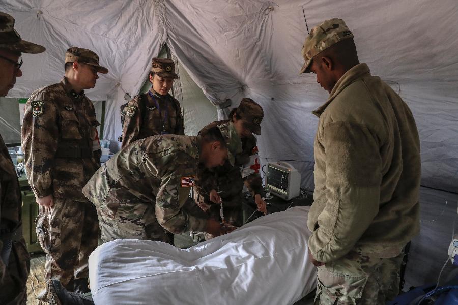 U.S. Army and China\'s People\'s Liberation Army (PLA) military personnel take part in the latest \