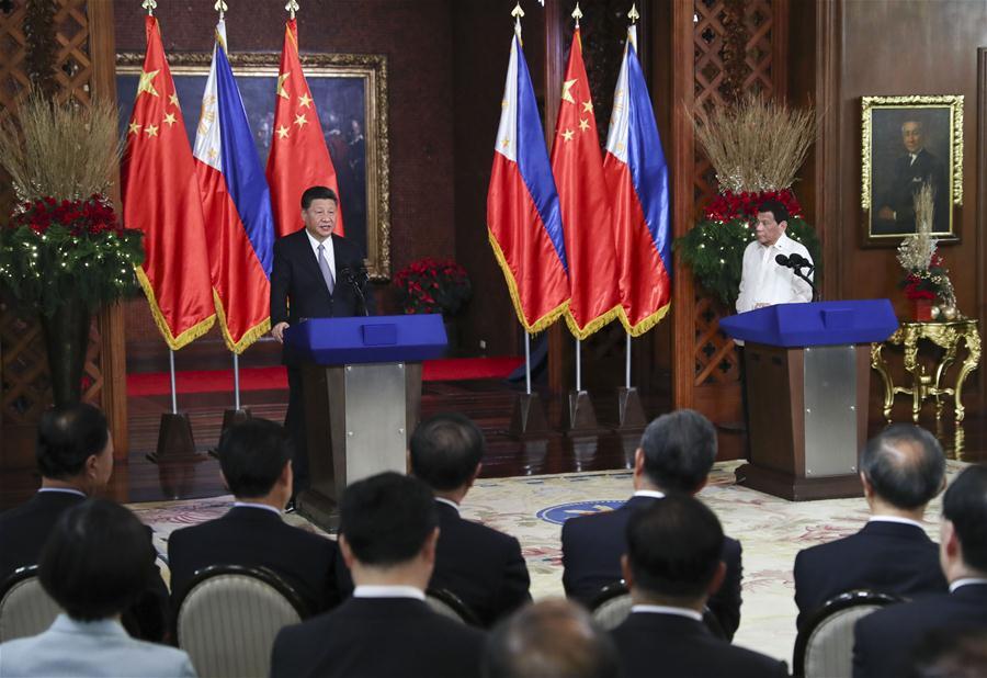 Chinese President Xi Jinping and his Philippine counterpart Rodrigo Duterte attend a joint press conference after their talks in Manila, the Philippines, Nov. 20, 2018. (Xinhua/Xie Huanchi)