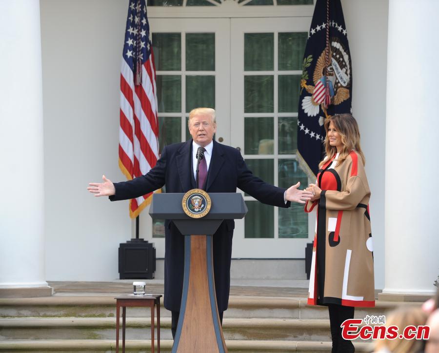 U.S. President Donald Trump (L) speaks during the National Thanksgiving Turkey Pardoning Ceremony at the Rose Garden of the White House in Washington D.C., the United States, on Nov. 20, 2018. (Photo: China News Service/ Chen Mengtong)