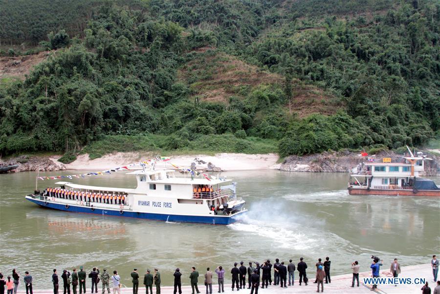 Patrol boats and cargo ships leave the port at the launching ceremony of the joint patrol of police force from China, Laos, Myanmar and Thailand along the Mekong River in Guanlei Port in Dai Autonomous Prefecture of Xishuangbanna, southwest China\'s Yunnan Province, Dec. 10, 2011. The 76th Mekong River joint patrol led by China, Laos, Myanmar, and Thailand started Nov. 20, 2018 from Guanlei Port, Xishuangbanna Dai Autonomous Prefecture in southwest China\'s Yunnan Province. According to Yunnan border police bureau, the joint patrol will last five days and cover a range of over 500 kilometers to enhance anti-terrorism capability, safeguard the security and crack down on cross-border crimes. Once every month since 2011, the patrols targeting drug trafficking, smuggling and other cross-border crimes along the Mekong, conduct random inspections in waters near key regions, including the Golden Triangle.The Mekong River, known as the Lancang River at the Chinese stretch, runs through China, Laos, Myanmar, Thailand, Cambodia and Vietnam. It is an important waterway for transnational shipping and a border area known for criminal activities. For seven years, security cooperation between the four countries has been getting closer with joint patrols a regular monthly phenomenon. The patrol includes anti-terrorism drills, police skill practices and anti-drug campaigns. Since December 2011, the joint patrols have covered more than 39,500 kilometers, with 122 merchant ships rescued and 582.28 kilograms of drugs seized. The cooperation has expanded to the cracking down on terrorism and human trafficking, as well as joint search and rescue. (Xinhua/Yuan Man)