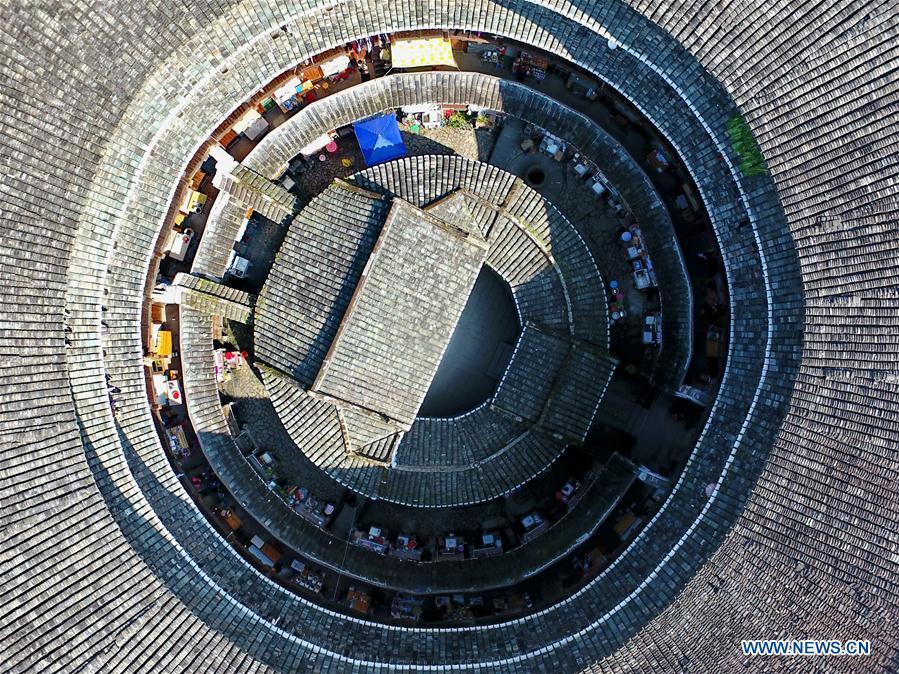 Photo taken on Nov. 23, 2018 shows Huaiyuan Tulou in Kanxia Village in Nanjing County of Zhangzhou City, southeast China\'s Fujian Province. Fujian Tulou, which dates back to Song and Yuan dynasties, is a type of Chinese rural dwellings of the Hakka people in the mountainous areas in Fujian Province. The layout of Fujian Tulou followed the Chinese dwelling tradition of \