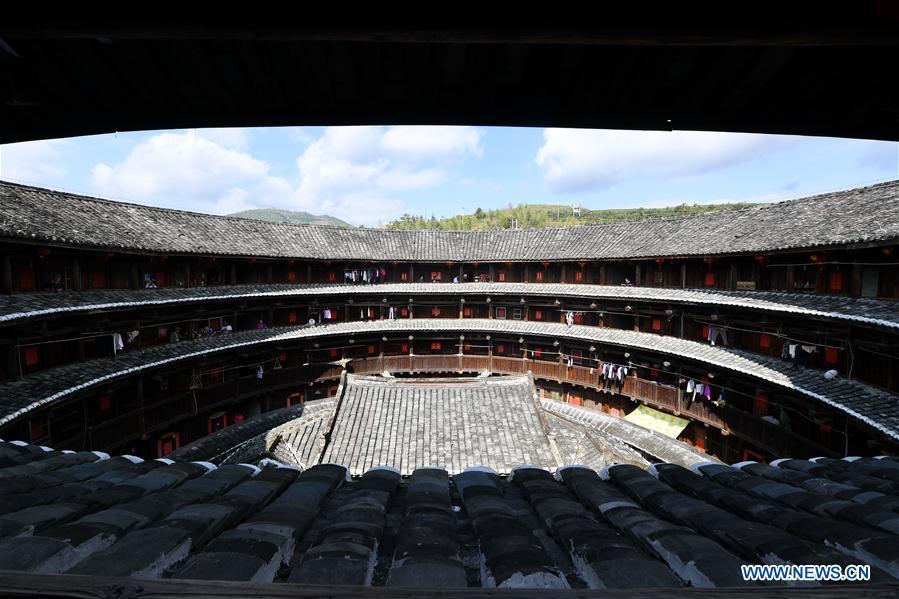 Photo taken on Nov. 23, 2018 shows Huaiyuan Tulou in Kanxia Village in Nanjing County of Zhangzhou City, southeast China\'s Fujian Province. Fujian Tulou, which dates back to Song and Yuan dynasties, is a type of Chinese rural dwellings of the Hakka people in the mountainous areas in Fujian Province. The layout of Fujian Tulou followed the Chinese dwelling tradition of \