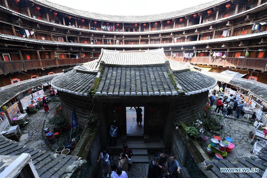Photo taken on Nov. 23, 2018 shows interior structure of Huaiyuan Tulou in Kanxia Village in Nanjing County of Zhangzhou City, southeast China\'s Fujian Province. Fujian Tulou, which dates back to Song and Yuan dynasties, is a type of Chinese rural dwellings of the Hakka people in the mountainous areas in Fujian Province. The layout of Fujian Tulou followed the Chinese dwelling tradition of \