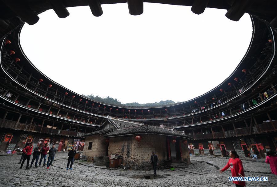 Photo taken on Nov. 23, 2018 shows Yuchang Tulou in Zhangzhou City, southeast China\'s Fujian Province. Fujian Tulou, which dates back to Song and Yuan dynasties, is a type of Chinese rural dwellings of the Hakka people in the mountainous areas in Fujian Province. The layout of Fujian Tulou followed the Chinese dwelling tradition of \