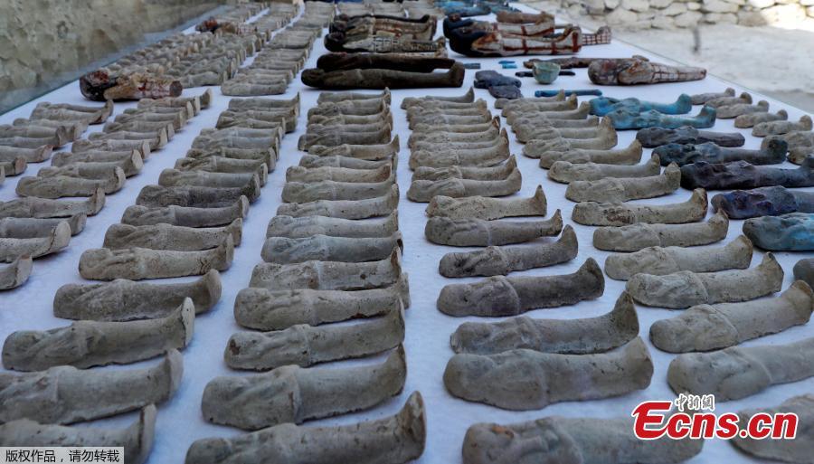 Statuettes are arranged outside a newly discovered tomb at al-Assasif Necropolis in Luxor, Egypt November 24, 2018. (Photo/VCG)