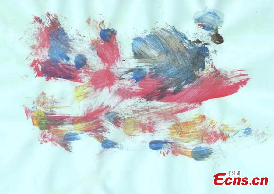 A painting created by an orangutan at a zoo in Nanjing, East China’s Jiangsu province. Leshen, a 19-year-old orangutan at Hongshan Forest Zoo can use a brush to create pictures. After being trained to use brush and pigments, the orangutan chose colors it liked and created six artworks. (Photo: China News Service/ Chen Yuanyuan)