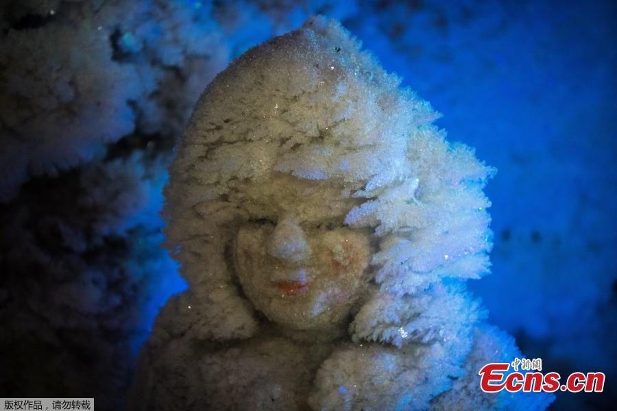 Ice forms on a Christmas-themed sculpture in the Museum of the History of Permafrost Studies located beneath the main building of the Melnikov Permafrost Institute in the eastern Siberian city of Yakutsk in Russia on November 26, 2018. (Photo/Agencies)
