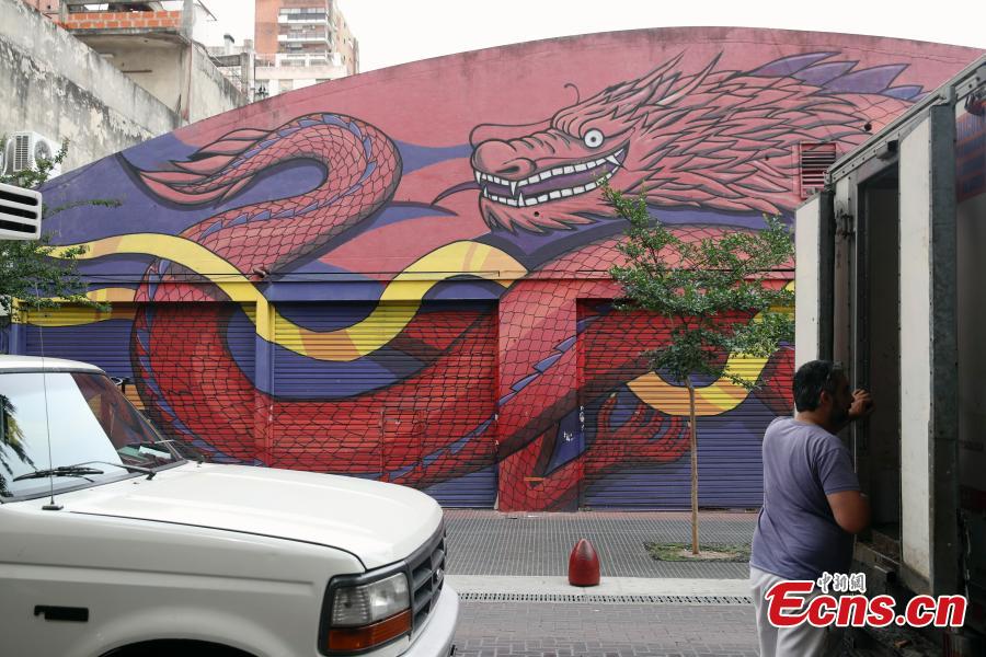 Image of a Chinese dragon is seen marked on a wall of a shop at the Chinatown in Buenos Aires, capital of Argentina. The 13th G20 summit, under the theme of Building Consensus for Fair and Sustainable Development, will be held in the South American country from Friday to Saturday. (Photo: China News Service/ Sheng Jiapeng)