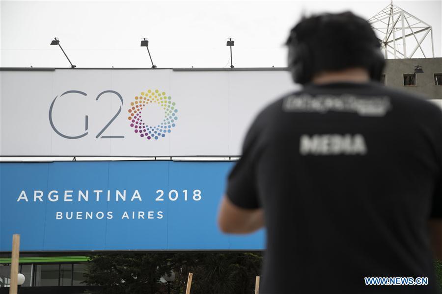 A cameraman works outside the Costa Salguero Center in Buenos Aires, Argentina, on Nov. 27, 2018. The 13th G20 summit, under the theme of Building Consensus for Fair and Sustainable Development, will be held for the first time in a South American country from Friday to Saturday. (Xinhua/Li Ming)
