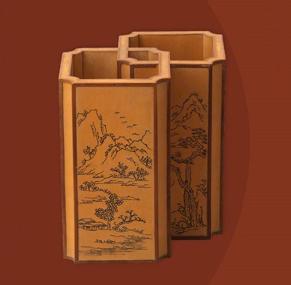 A bamboo paired brush pot engraved with landscape paintings from the Qianlong Period of the Qing Dynasty. (Photo/Official Weibo account of the Palace Museum)