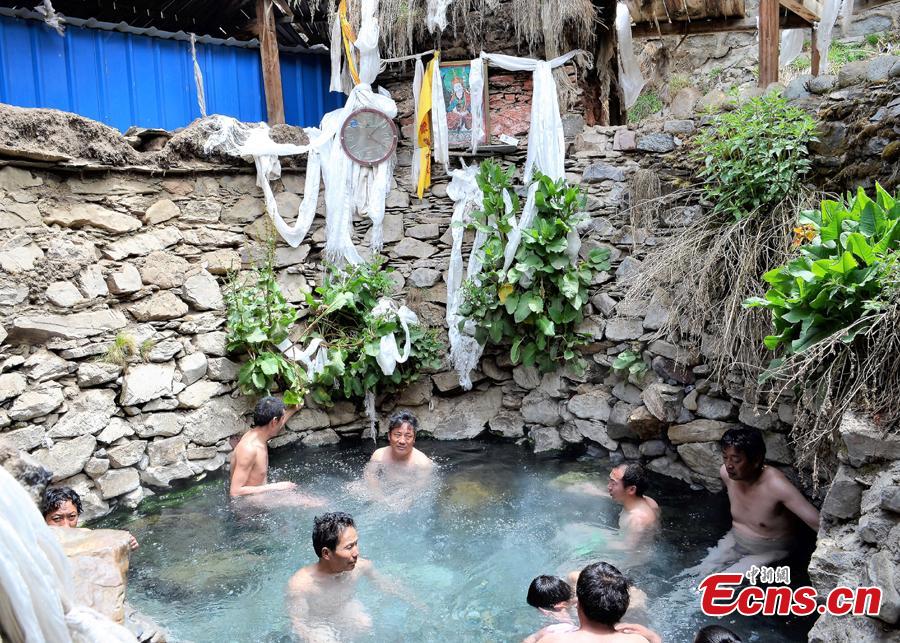 People take a bath in a hot spring, 4590 meters above sea level in Tibet. The 13th session of the UNESCO Intergovernmental Committee for the Safeguarding of the Intangible Cultural Heritage inscribed Lum medicinal bathing of Sowa Rigpa onto the Representative List of the Intangible Cultural Heritage of Humanity, at a convention held in Port Louis, capital of the Republic of Mauritius, Nov. 28, 2018.(Photo provided by the National Center for the Safeguarding of the Intangible Cultural Heritage in China)