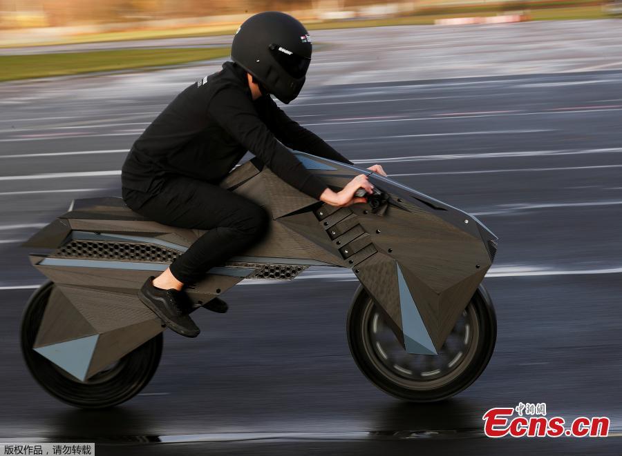 Designer Marco Mattia Cristofori of the German 3D printer manufacturer BigRep, rides his nearly completely 3D printed e-motorcycle NERA, at the airfield Tempelhof in Berlin, Germany, December 3, 2018.(Photo/Agencies)